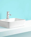 Countertop Bathroom Sinks 18.8"X14.5" Rectangular Bathroom Sink, Above Counter Ceramic Vessel Sink With Faucet, White Vanity Sink Basin Bathroom Vanity Sinks Basin on a blue background.