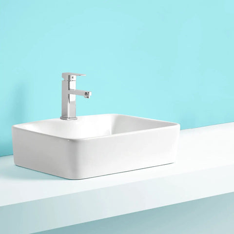 Countertop Bathroom Sinks 18.8"X14.5" Rectangular Bathroom Sink, Above Counter Ceramic Vessel Sink With Faucet, White Vanity Sink Basin Bathroom Vanity Sinks Basin on a blue background.