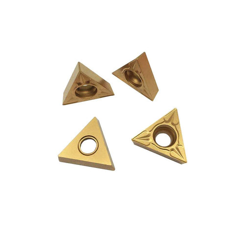 Four TCMT32.51 carbide turning inserts, triangular with center hole, yellow color