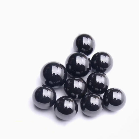 Premium Silicon Nitride Ceramic Ball Bearings Built Tough For Extreme Heat And Heavy Loads At Sixty Three Point Five Millimeters, glossy black spheres.