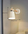 EDFGVH Single Heads Iron Art Lamp Body Wall Lamps with E26/E27 Metal Base Sconces 10.6in mounted on a wall beside a bed.