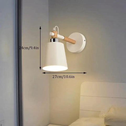 EDFGVH Single Heads Iron Art Lamp Body Wall Lamps with E26/E27 Metal Base Sconces 10.6in mounted on a wall beside a bed.