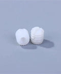 Close-up of white plastic dowel inserts from 1000 Pcs Heavy Duty White Plastic Dowel Nut Kit With Screw Dowel Inserts For Bathroom And Kitchen