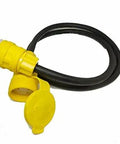 Top Shelf Industrial Waterproof Extension Cord Featuring Nema L21 30 Plug 10 Gauge Power Cable 100 Ft Heavy Duty UL Listed CSA Certified Wetguard Locking Connector For Real World Construction Jobsites close-up of yellow NEMA L21-30 plug and black rubber cord.