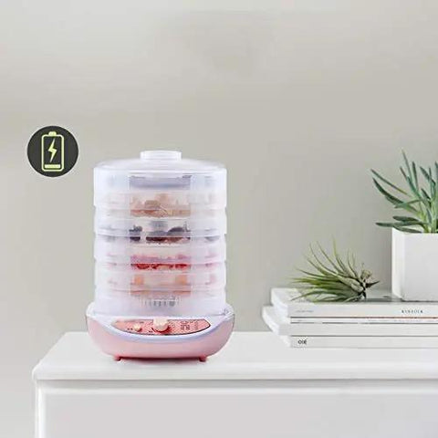 Slick Digital Food Dehydrator Featuring Five Stackable Trays Adjustable Heat Control Plus Solid Forty Eight Hour Timer with dried fruits.