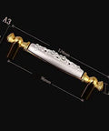 Modern 96Mm Cabinet Pull And Drawer Knob Featuring Crisp White Base With Dazzling 24K Gold Crystal Accent, 96mm size.