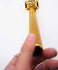 Adjustable 25.4x300mm Aluminum Alloy Seatpost For MTB Road Bike And BMX, gold finish being held by hand, showing length