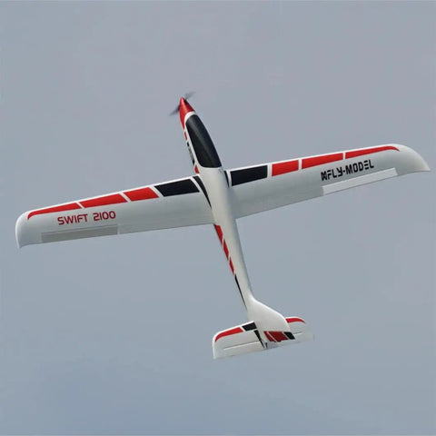Swift 2100 RC Glider For Beginners Starter Friendly 82.7 Inch Wingspan PNP Kit in flight, showing bottom view of carbon fiber airframe.