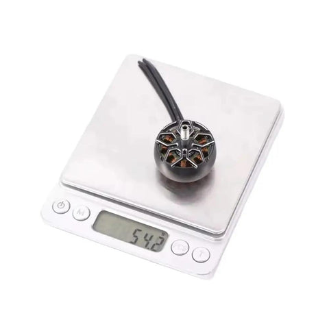 2809 Brushless RC Motor 1250KV/800KV With 5mm Shaft on digital scale showing weight for 7 to 8 inch FPV drones