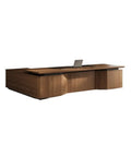 Boss Mode Executive Computer Desk For Home Office Large Standing Workstation with a sleek wooden finish and laptop on top.