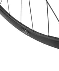 Close-up of 45mm Carbon Tubeless Wheelset For Disc Brake Road Bikes With 25mm Inner Width No Paint Finish Tubeless Ready