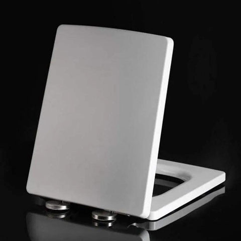 Premium Heavy Duty Thick Square Toilet Seat Cover With Silent Slow Close Hinges And Elevated Height Support For Reliable Daily Access and Built Tough Heavyweight Comfort, angled view showing slow close mechanism.