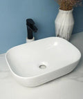 USZWBY Vessel Sinks Square Rounded Corner Simple Sink Ceramic Above Counter Wash Basin with smooth curved edges.