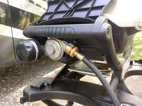 Propane Hose 1lb To 20lb Adapter For 12 Foot Connection attached to grill, showing safe flow and thermal protection, Weber Q compatible.