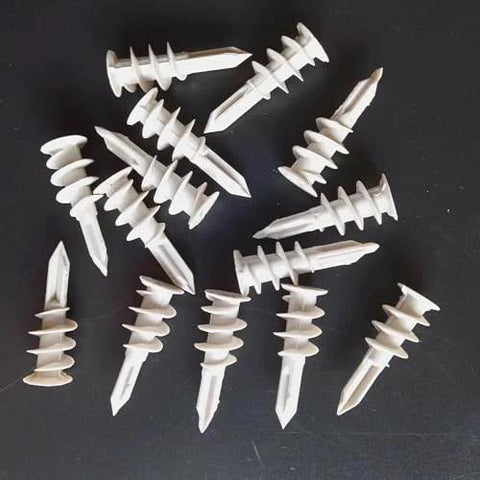 Self Drilling Drywall Anchors Set 100 Pcs With Screws And Reusable Storage Case Durable Plastic Hollow Wall Anchors on black surface
