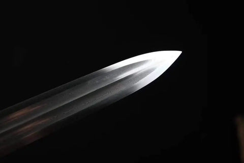 Close-up of the blade of a Fully Handmade Damascus Steel Folding Blade Sword With Rosewood Scabbard And Brass Fittings Heat Tempered.