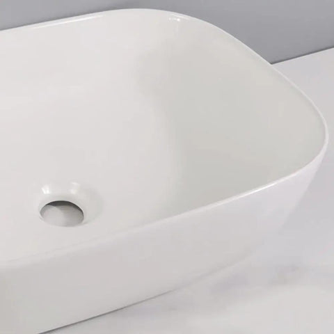 USZWBY Vessel Sinks Bathroom Simple Ceramic White Above Counter Wash Basin Rectangular Modern Art Bathroom Bowl Sink close-up angle.
