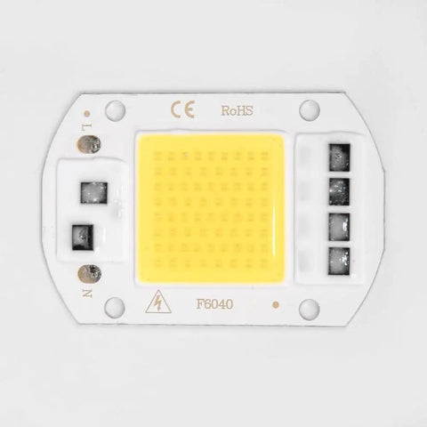LED COB Chip Floodlight Bulb 20W 30W 50W 220V Input High close-up of COB chip with yellow light surface.