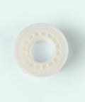Heavy Duty Four Pack Faucet Lock Nuts For Under Sink Plumbing And Fixture Setup One Half Inch Female Thread Coupling white plastic part top view