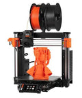 MK4S 3D Printer Kit With Automatic Calibration And Removable Sheets, showing front view with printed model and filament spool