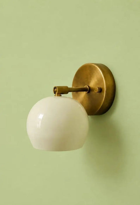 Modern Brass Wall Sconce Light Fixture with white glass shade, 5" W x 7" H size, ideal for bathroom, bedroom, or hallway.