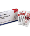 First Aid/Burn Cream box from First Aid Only with six packets beside it.