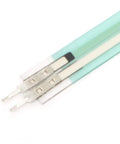 Pair of FSR402 force-sensing resistor strips on teal flexible film with metal leads (front view)