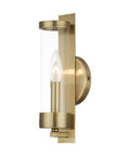 Castleton Antique Brass 1 Light ADA Wall Sconce With Clear Glass Cylinder, classic yet modern hallway and bath accent lighting