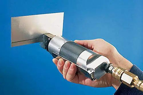 Handy Pneumatic Flanger Punch Tool in use on sheet metal showing Seven Thirty Second Inch Punch and 0.040 Inch Offset Flanges