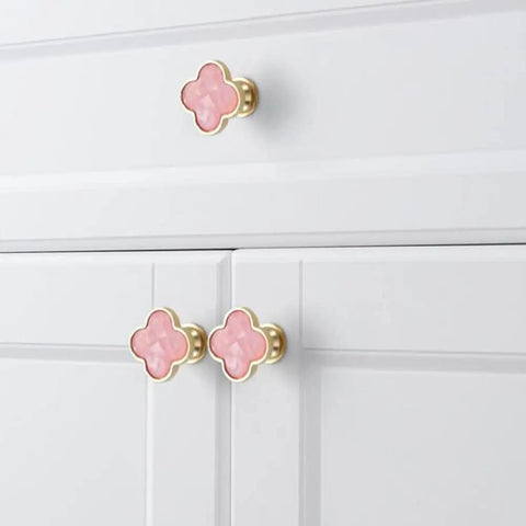 Sweet Looking Pink Clover Drawer Knobs Six Pack For Dressers And Kitchen Cupboards Smooth Zinc Alloy Hardware, pink clover knobs on white drawer.