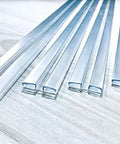 Heavy Duty Clear PVC Hinge System For Acrylic And Plexiglass Panels Seventy Two Inch Four Pack displayed on a wooden surface.