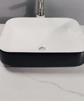 Bathroom Sink Modern Simple Black Appearance Above Counter Basin Ceramic Wash Basin Apartment Home Bathroom Ceramic Above Counter Basin Bathroom Sink Vessel, top view on marble countertop.