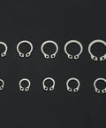 Stainless Steel Retaining Circlips Set 100 Pcs M8 M9 M10 Internal External Snap Rings Kit For Mechanics And DIYers Gear Up With This Heavy Duty Assortment Of Internal And External Rings displayed on black background.