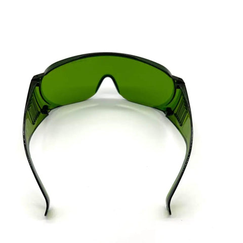 Badass OD5 Laser Protection Goggles Covering 190 To 470 Nm And 800 To 1700 Nm With Tough As Nails Shield front view with green lenses.
