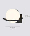 Solid Metal Wall Sconce With Glass Housing Delivers Hella Bright Ambient Glow perfect for indoor and outdoor decor, 15x18cm.