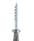 Close-up of a carbon steel self-tapping wood screw showing coarse threading and sharp tip for quick home repairs.