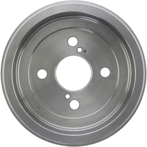 Front view of a metal rear brake drum with central bore and multiple mounting holes