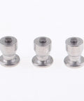 Close-up of removable tungsten carbide ice grip screws for hardcore tire spikes for cars and trucks winter snow chain replacement.