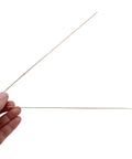 Hand holding two 4 Pack Stay Silv 15 Percent Flat Brazing Rods 20 Inch for Copper to Copper HVAC R Applications with Moderate Fit Up.