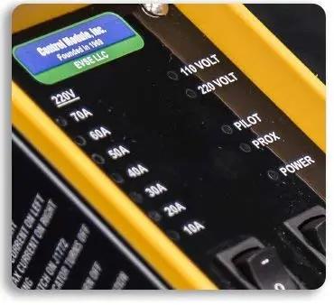 Close-up of Sae J1772 Electric Vehicle Charger Tester For Checking Level 1 And 2 Stations with voltage indicators.