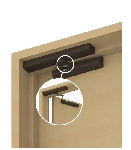 Heavy Duty Door Damper For Left Hinged Doors Quiet Soft Close Face Mount Hardware Dark Brown Cover close-up installation on door frame.