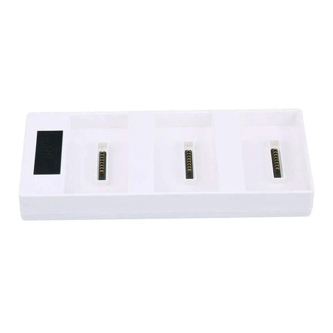 Top view of Drone Battery Charging Hub With LED Display And Intelligent Sequencing Anti Slip Feet For Stable Setup Lightweight Portable Multi Charger For Up To Four Batteries And Drones on a white background.