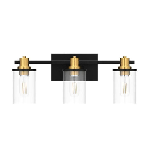 Three Light Black And Gold Bathroom Vanity Light Fixtures Over Mirror With Clear Glass Shade, frontal view.