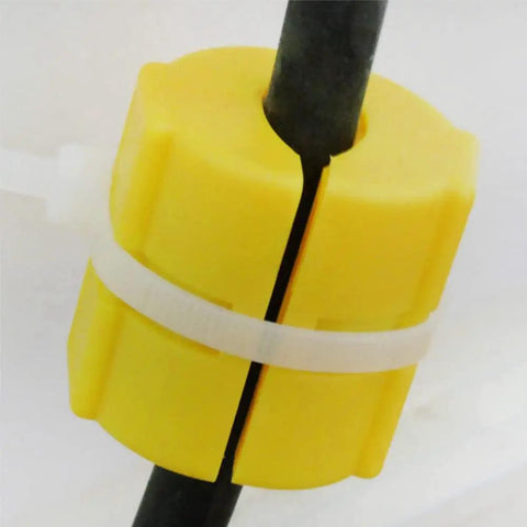 Close-up of a yellow Magnetic Fuel Saver Kit For Cars, Four Piece XP-2 Universal Emission Vehicle Economizer Gas Device, ABS Construction.