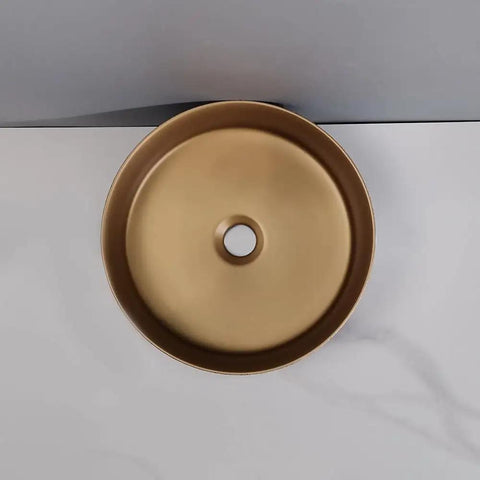 Top view of UMJIGF Bathroom Countertop Vessel Sink Bathroom Vessel Sink Bathroom Light Luxury Ceramic Basin round gold design.