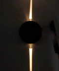 Jeanoko Contemporary Aluminum Wall Light Sconce 6W LED Lamp for Dining, round design in soft warm glow on wall.