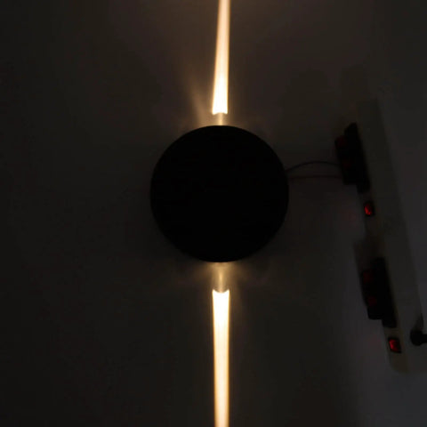 Jeanoko Contemporary Aluminum Wall Light Sconce 6W LED Lamp for Dining, round design in soft warm glow on wall.
