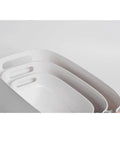 Top Shelf White Plastic Storage Basket With Lidless Opening For Zero Fuss Organization And Straight Up Space Saving Efficiency Ideal For Cozy Living Room Or Bedroom Vibes; three bins stacked, showcasing open top design and handle.