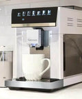 Barista-Grade All In One Espresso Machine With Built In Grinder Milk Frother And Steamer Auto Tamper Descaler Color Touch Display And One Touch Drinks Like Espresso Cappuccino Latte Macchiato Americano For Home Or Office White shown on kitchen counter