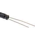 Single capacitor from the Through Hole Electrolytic Capacitor Assortment Kit, 120 Pcs Total, 12 Types, 0.22uF To 470uF Range